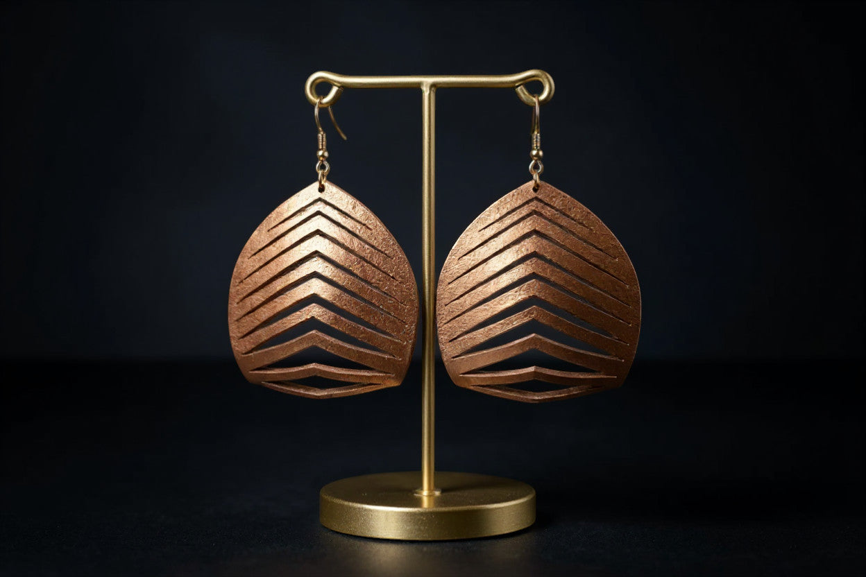 Rejecting Retail Studio copper hand-painted genuine leather statement earrings with laser-cut chevron pattern.