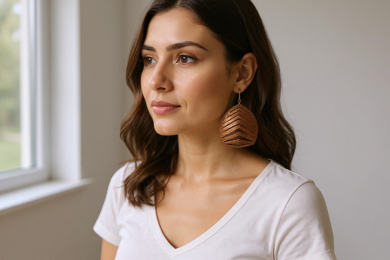 Rejecting Retail Studio copper hand-painted genuine leather statement earrings with laser-cut chevron pattern.