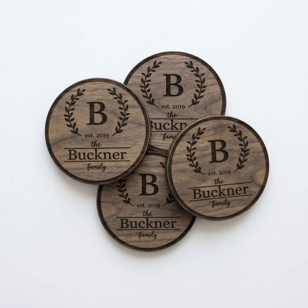 Rejecting Retail Studio set of 4 personalized engraved mango wood coasters with monogram and family name.