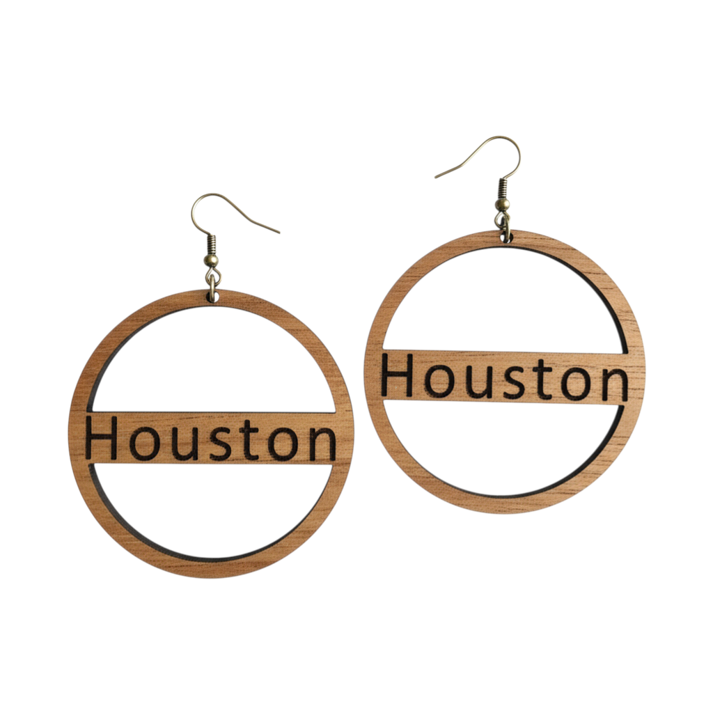 Rejecting Retail Studio natural wood hoop earrings laser-engraved with the city name Houston in a vintage serif font.
