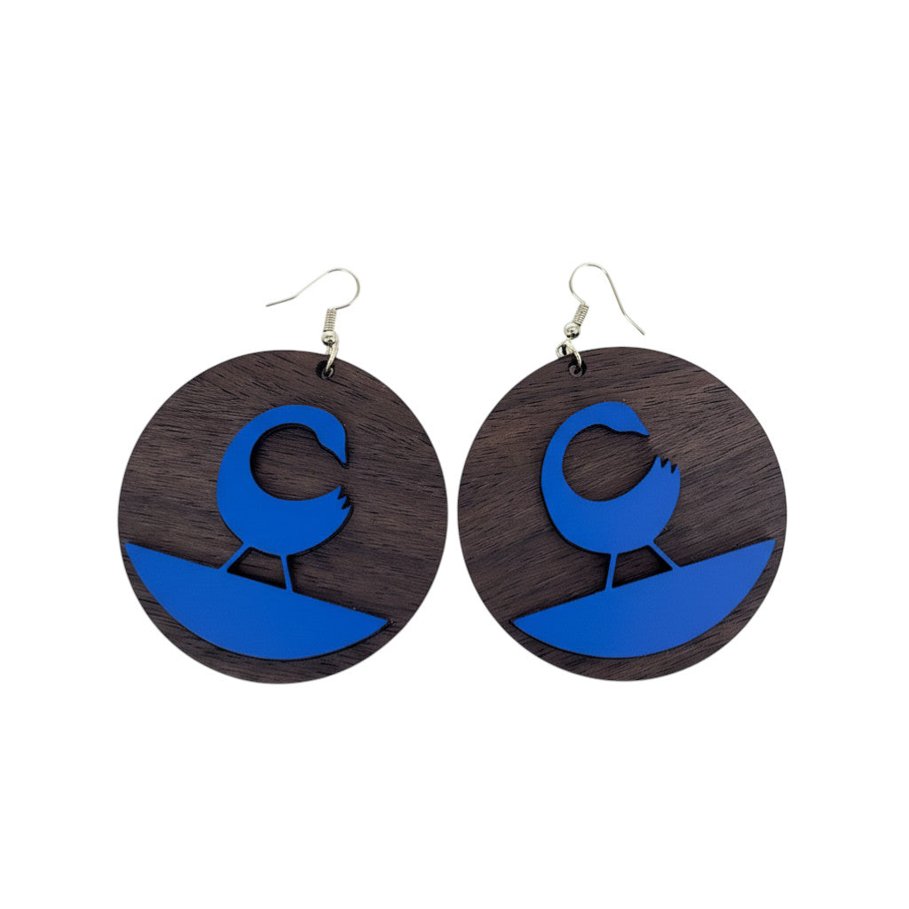 Rejecting Retail Studio Sankofa earrings: dark walnut wood circles with cobalt blue leather Sankofa bird inlay. Gold hooks.