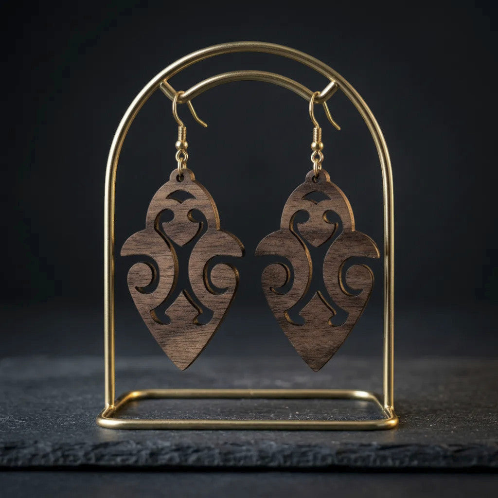 Rejecting Retail Studio walnut wood dangle earrings with ethnic cutout design. Lightweight, hypoallergenic.