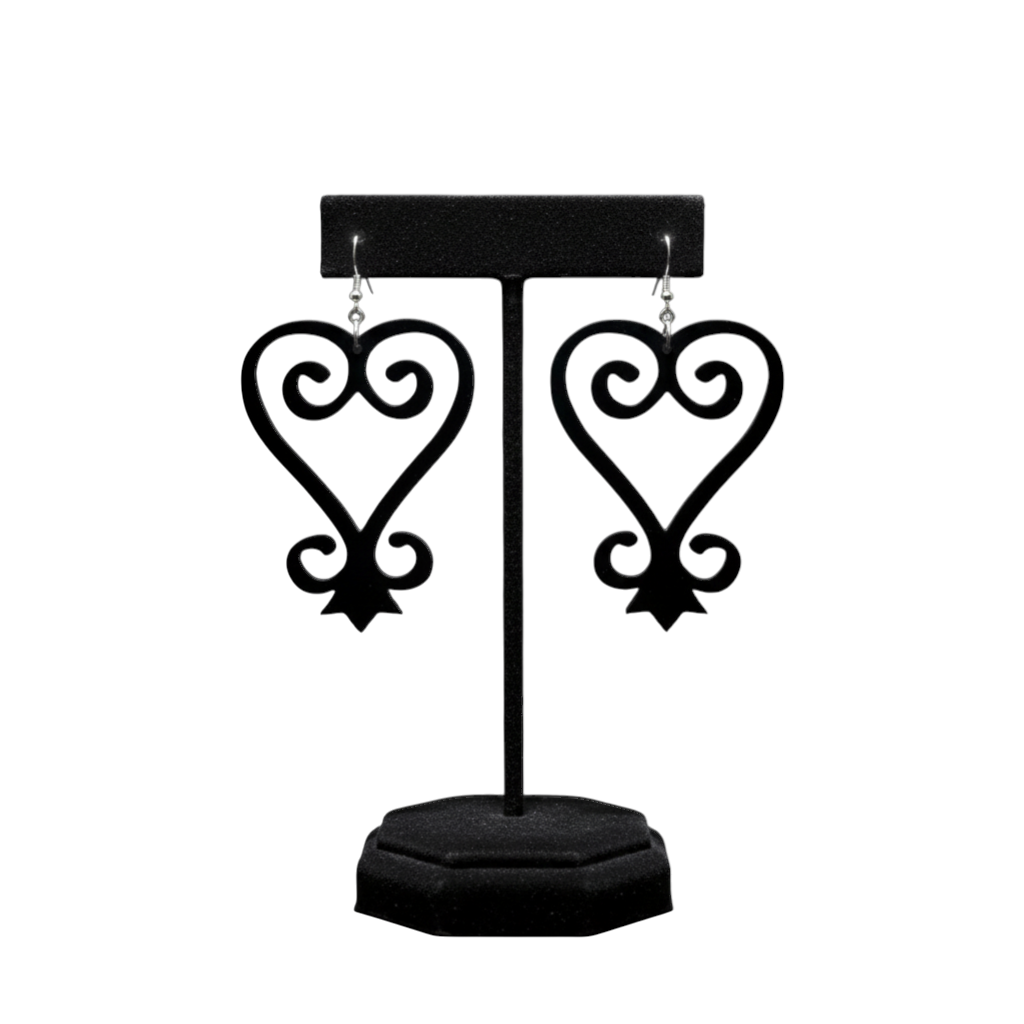 Rejecting Retail Studio black acrylic Sankofa earrings with hypoallergenic ear wires. Lightweight statement jewelry.