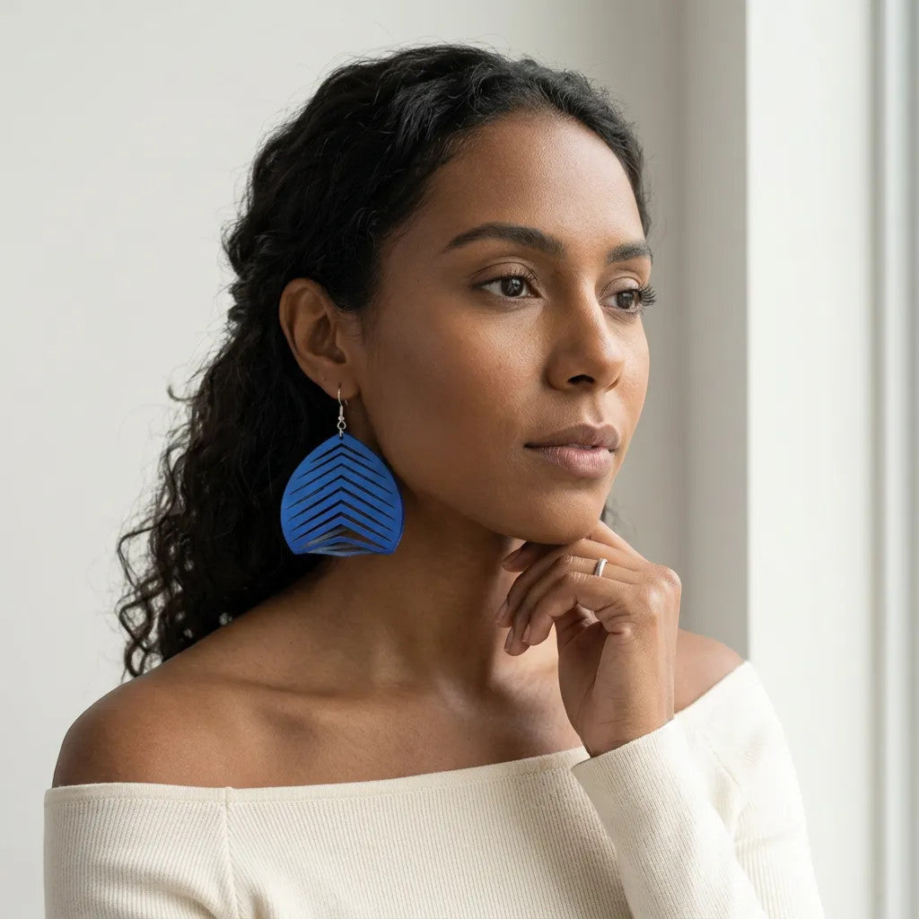 Rejecting Retail Studio large blue genuine leather statement earrings with chevron pattern. Hypoallergenic.