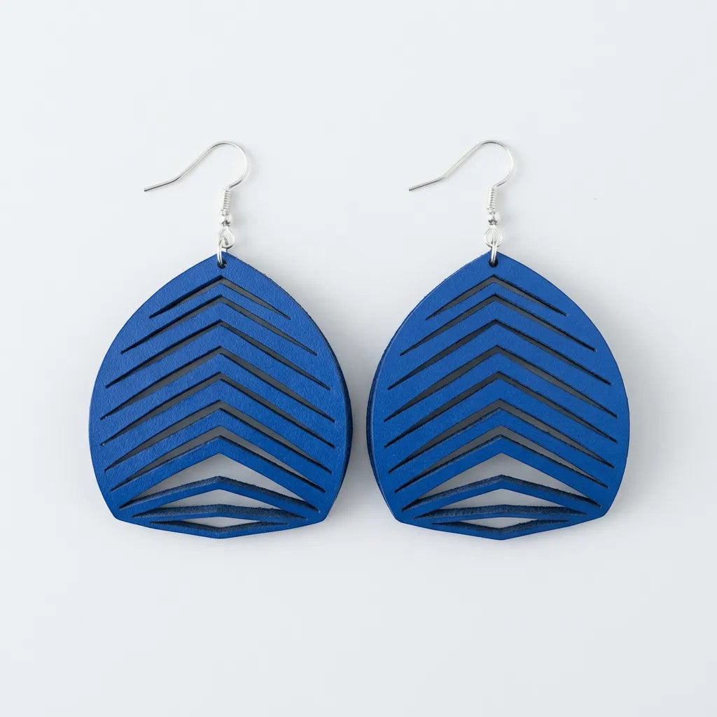 Rejecting Retail Studio large blue genuine leather statement earrings with chevron cutouts.