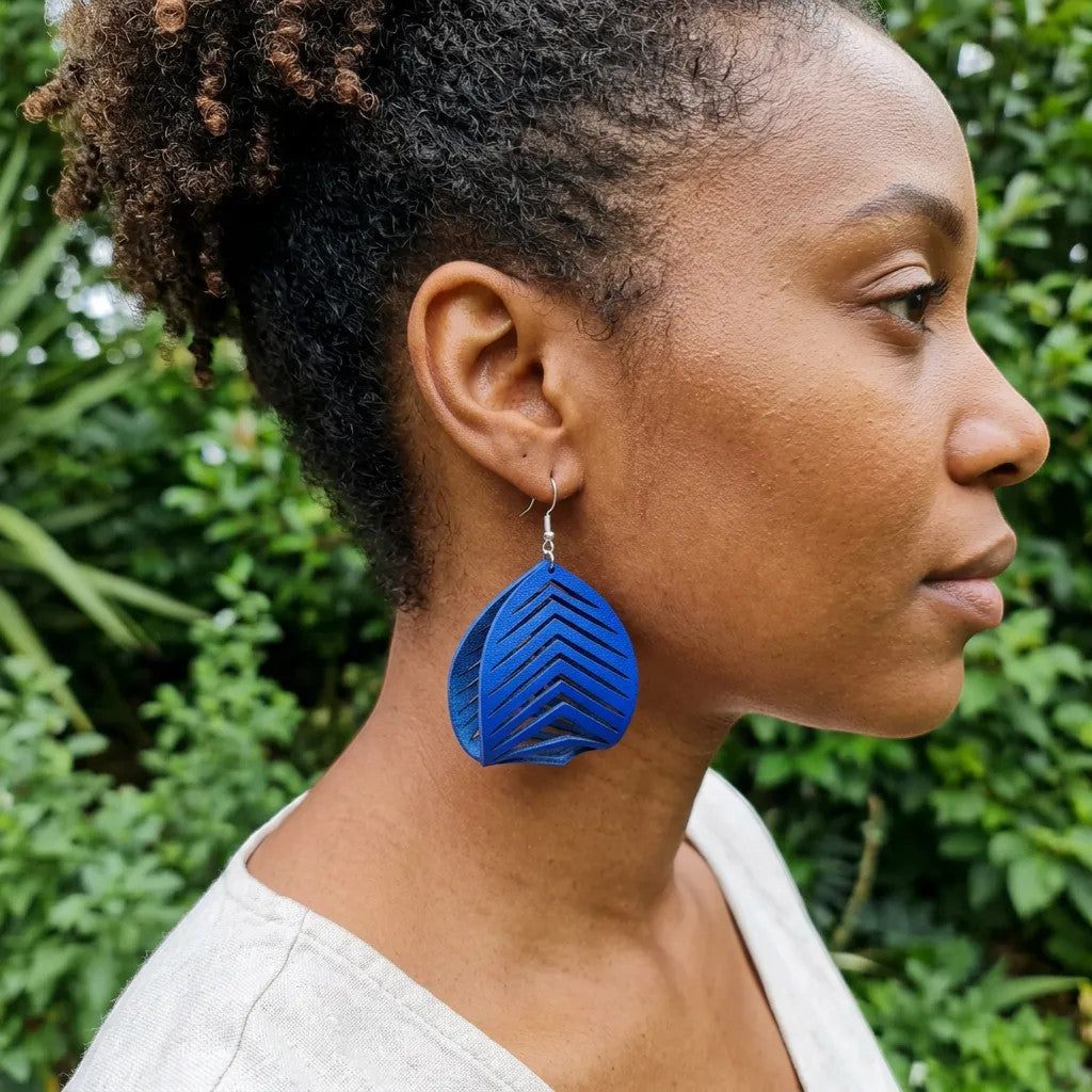 Rejecting Retail Studio large blue genuine leather statement earrings with chevron pattern, hypoallergenic ear wires.