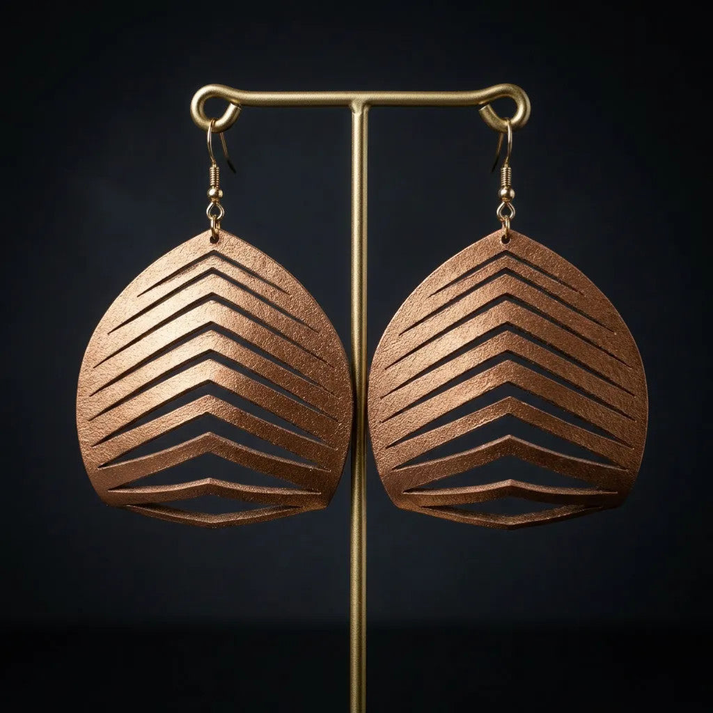 Rejecting Retail Studio copper hand-painted genuine leather statement earrings with laser-cut chevron pattern.