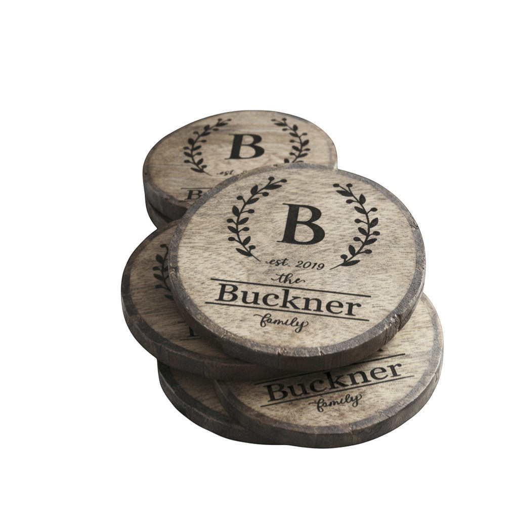 Rejecting Retail Studio personalized engraved mango wood coaster set of 4 with laurel wreath and family name.