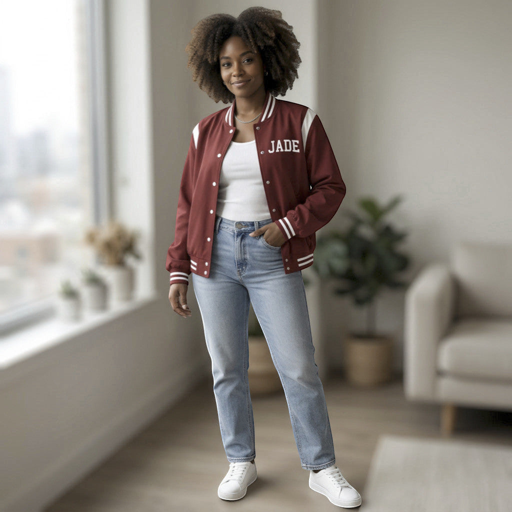 Rejecting Retail Studio personalized maroon varsity jacket with white trim and custom "JADE" embroidery.