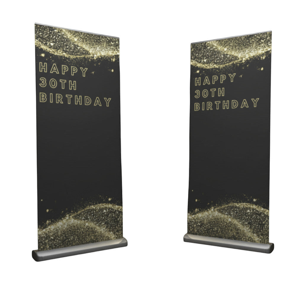 Rejecting Retail Studio personalized black and gold vinyl birthday banner with retractable stand, featuring glitter accents and custom photo.