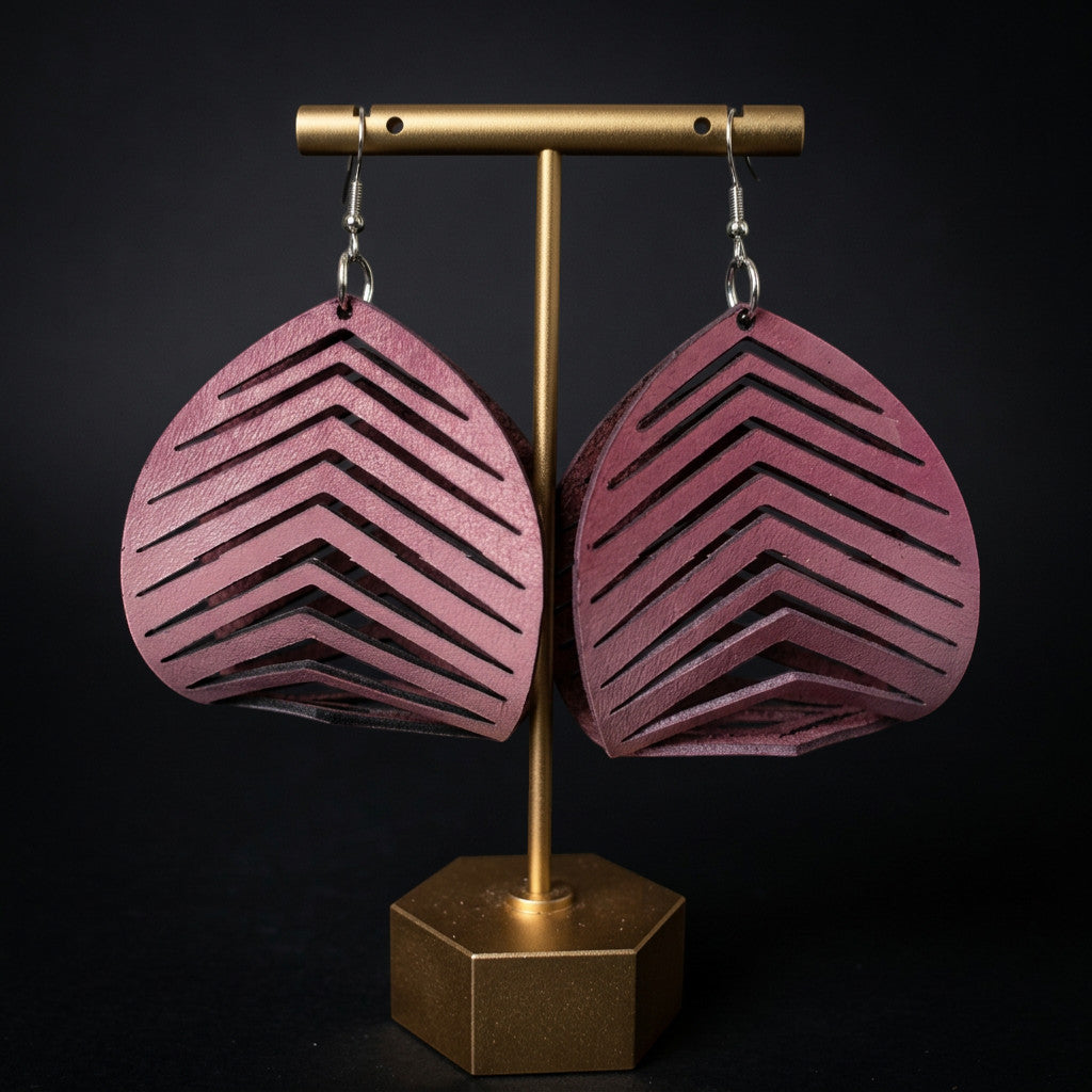 Rejecting Retail Studio ombré pink sculpted genuine leather statement earrings with chevron cutouts.