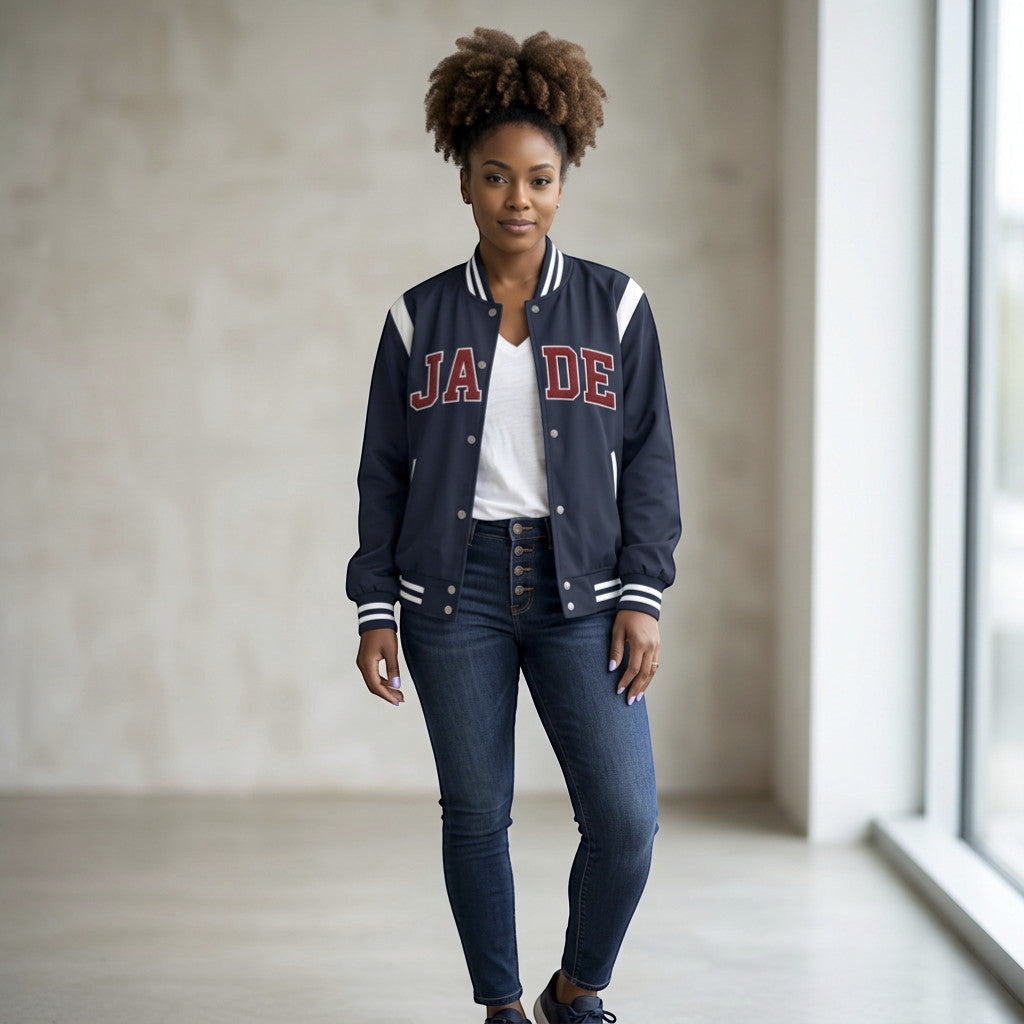 Rejecting Retail Studio navy blue embroidered varsity jacket with red "JADE" lettering and white accents. Custom letterman bomber style.