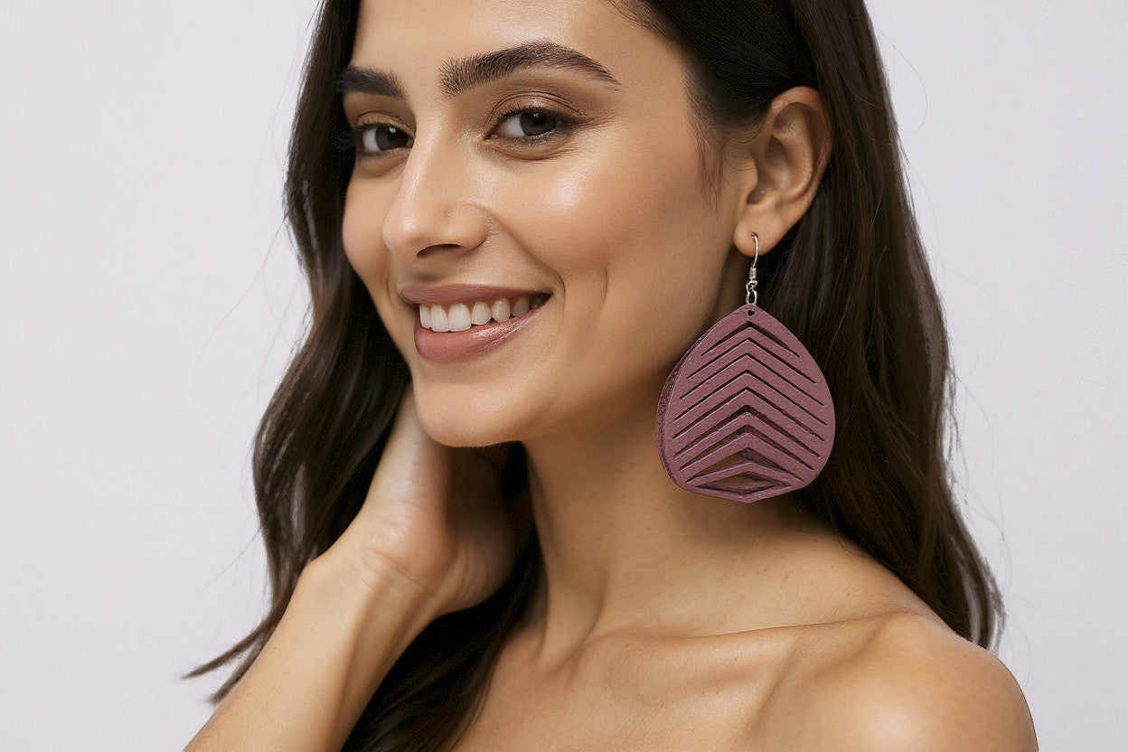 Rejecting Retail Studio ombré pink genuine leather statement earrings with chevron cutouts and dimensional layering.