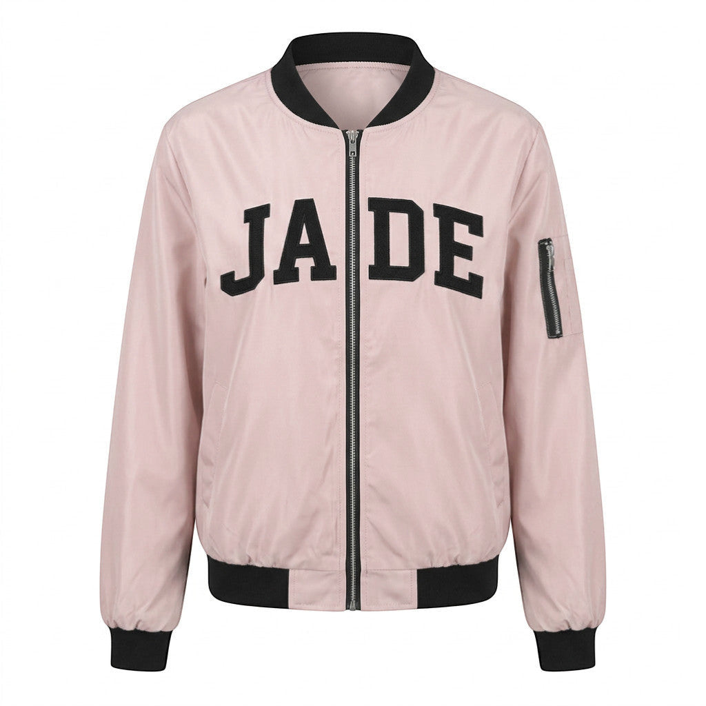 Rejecting Retail Studio pink zip-up varsity bomber jacket with black trim and custom embroidered name "JADE".
